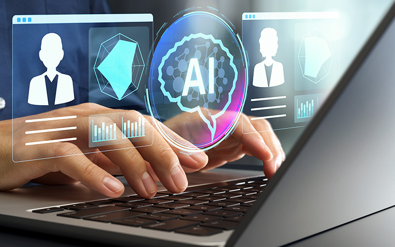 Un professionista utilizza un software di intelligenza artificiale per il recruiting, evidenziando il tema dei bias negli algoritmi di selezione.